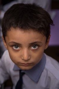 Close up of Pakistani child in school uniform