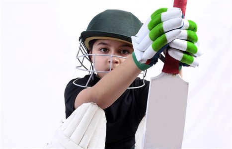 Cricket player batsman on white background