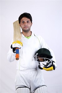 Cricket player batsman on white