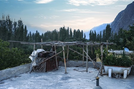 making sheltering with wood on top roof mountains as background