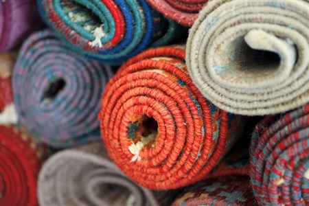 Folded stack of rugs