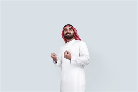 Arab middle eastern Saudi man feeling happy and successful