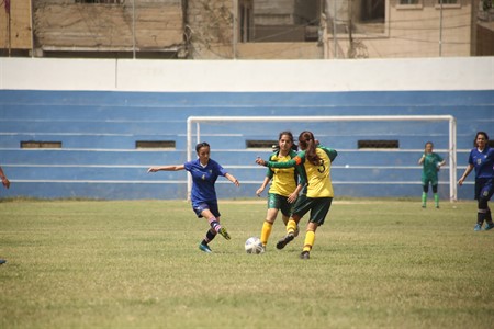 Girls playing Football  