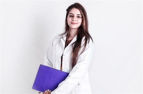 Female Medical Student - Lady Doctor with books 