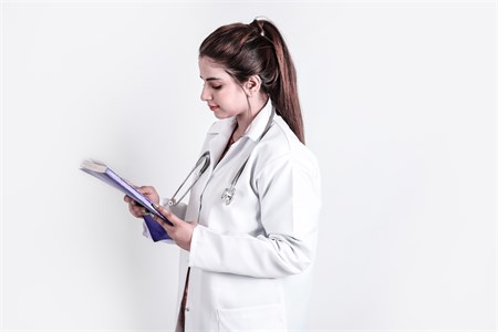 Female Medical Student - Lady Doctor with books 