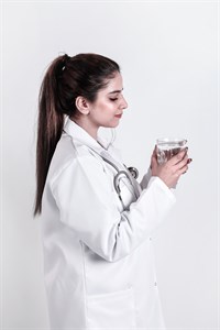  Female Medical Student - Lady Doctor with water glass