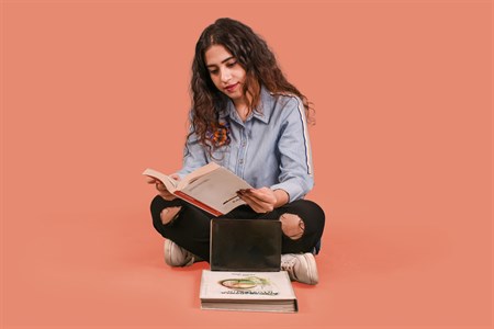 Girl Student with Books studying