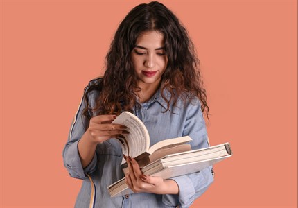 Girl Student with Books studying