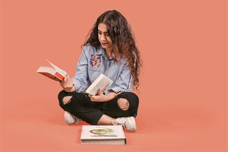 Female Student with Books studying